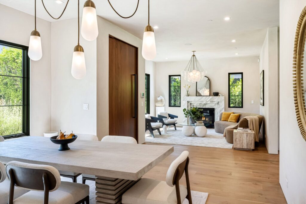 A modern living space with bright lighting and artwork